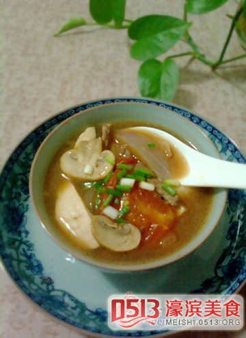 ţ